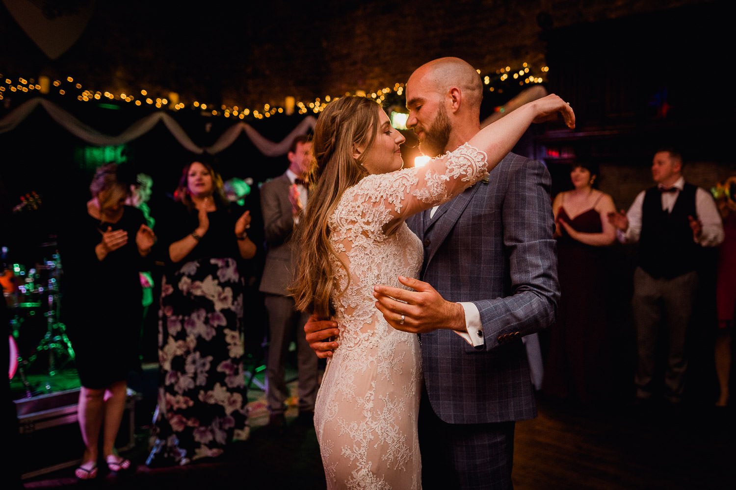 bride and groom dancing on a dance floor