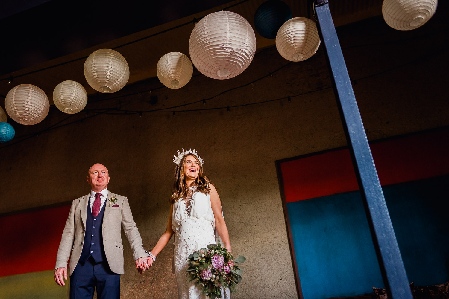bride and groom standing in the barn at Mound Druid