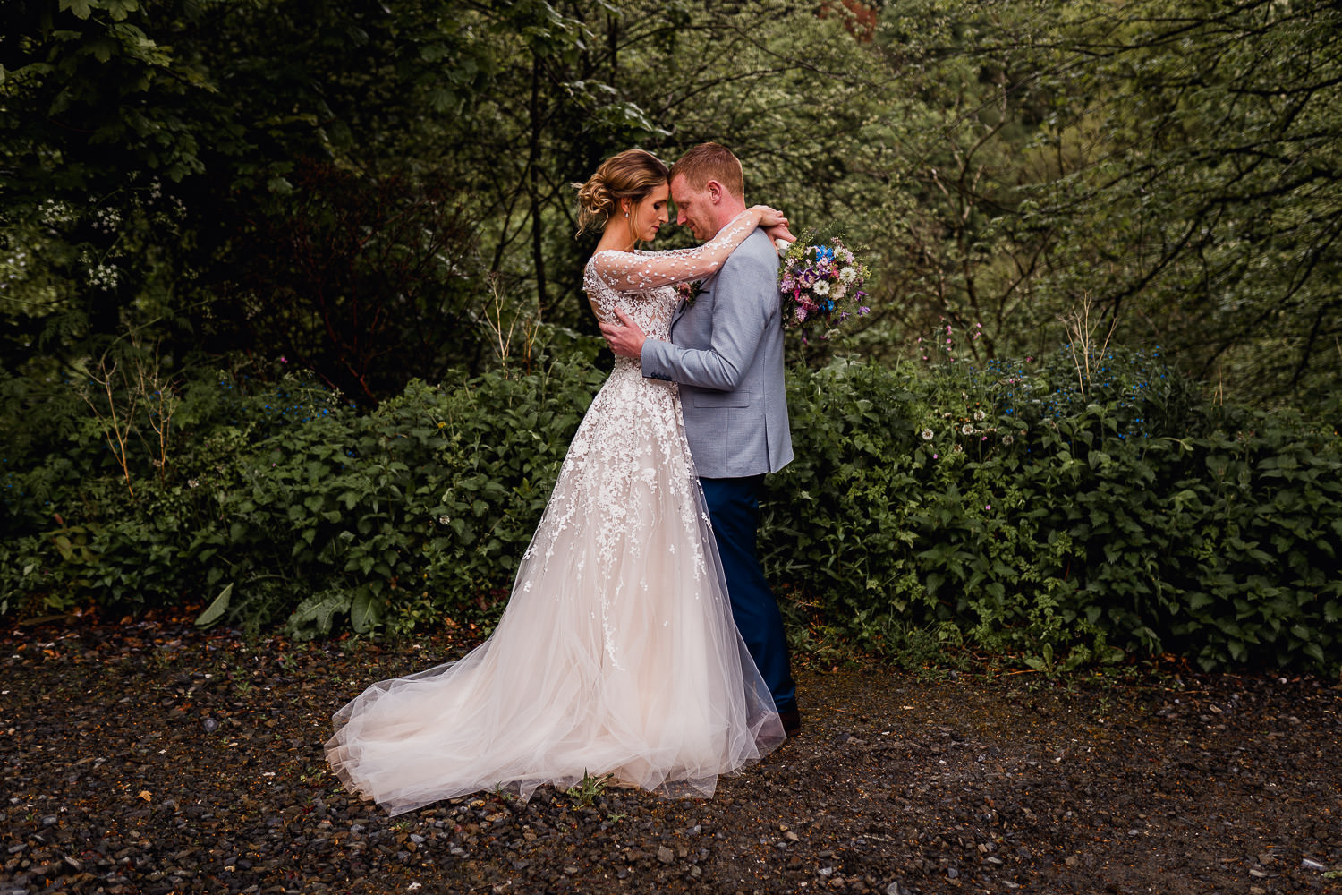 bride and groom hugging each other at Poulaphouca House